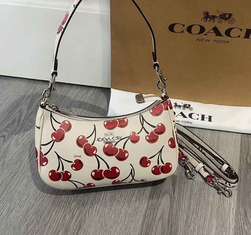 cherries coach purse